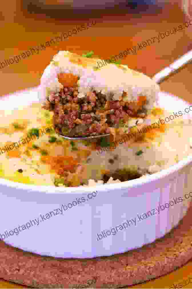 A Piping Hot Serving Of Shepherd's Pie, With A Golden Brown Mashed Potato Topping And A Rich, Savoury Ground Beef Filling Explore A New World Of Ground Beef: Amazing Ground Beef Recipes You Should Try Out