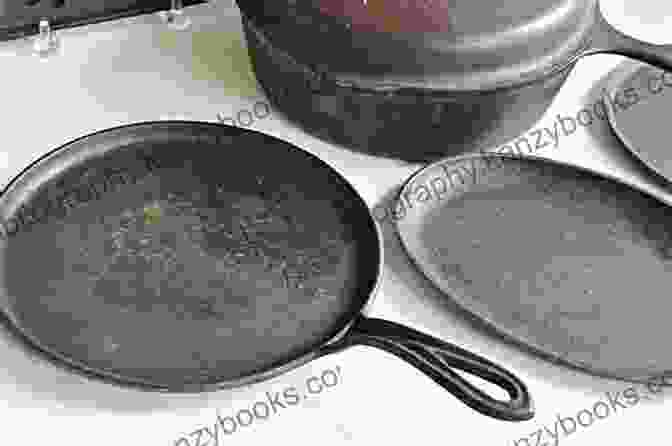 A Vintage Cast Iron Pan Alongside A Modern One, Showcasing The Cookware's Timeless Appeal Cast Iron Cuisine: Essential Tools For Your Iron Cookware: Making Cast Iron Pan Food