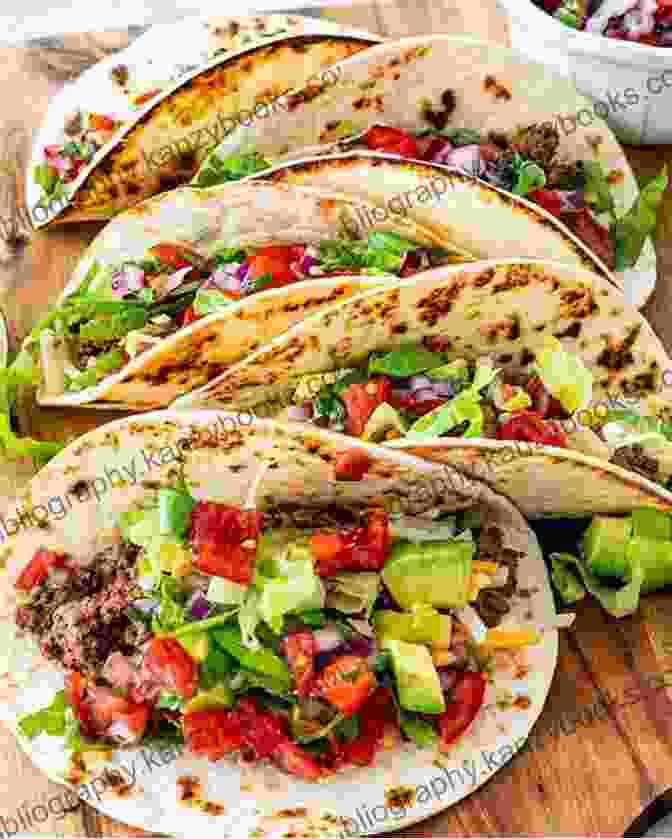 An Assortment Of Colourful Tacos, Each Filled With A Different Ground Beef Mixture And Topped With Fresh Ingredients Explore A New World Of Ground Beef: Amazing Ground Beef Recipes You Should Try Out