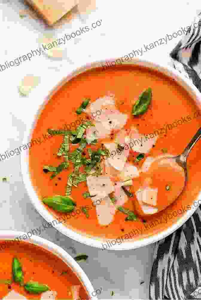 Creamy Tomato Soup Garnished With Fresh Basil Leaves And A Drizzle Of Olive Oil Holiday Homemade Soup And Salad Recipes Including Fruit Salad And Vegetable Soup